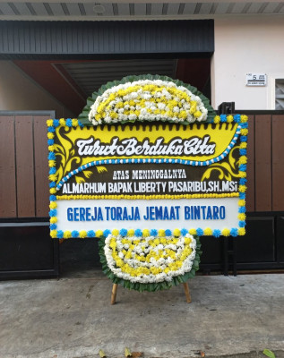 Papan Bunga Duka di Mongkonai